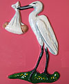 Stork and baby. Facing left. 5.5” x 4.5”