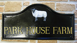 The skilfulness of our artist makes our emblems life-like and this Suffolk Ewe is no exception.  It fits perfectly in the arch of this Lancaster with the name set out in Condensed Times lettering in gold below it. 