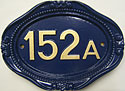 Norfolk number plaque with blue background and gold number