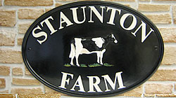 This Oxford 2316 sign has 83mm (2½”) Times lettering, painted white, which is an excellent choice of colour to go with the black and white Fresian cow