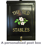 traditional post box THE OLD STABLES with clematis emblem